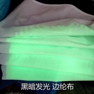 Photoluminescent tricot fabric